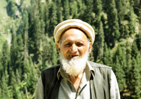 An elderly Pakistani man in the northern mountains