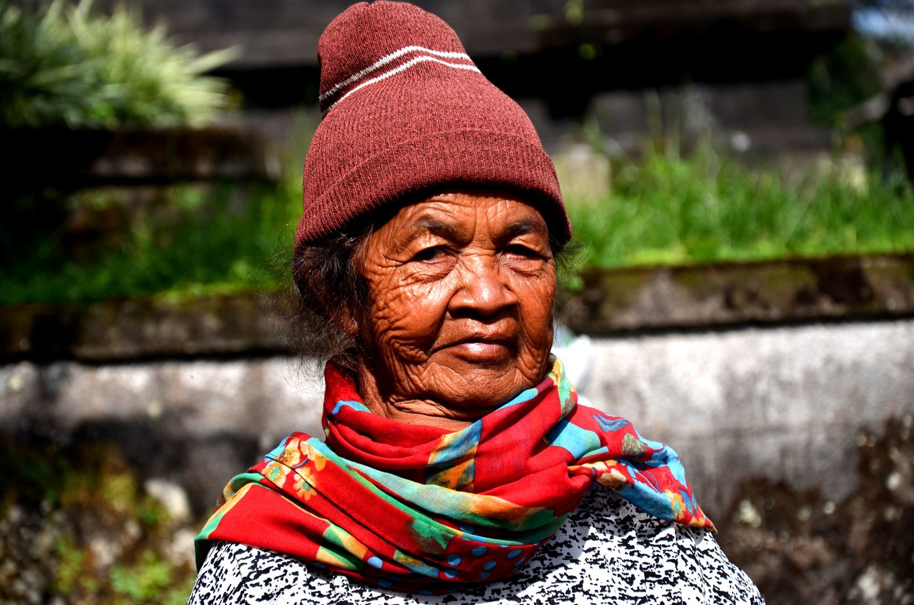 A dignified elderly Indonesian woman