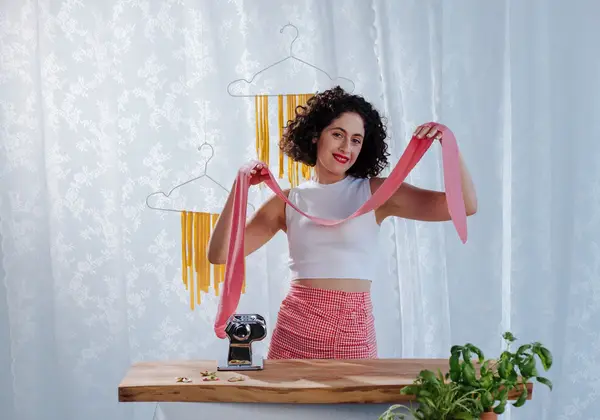 An Italian woman making fresh pasta