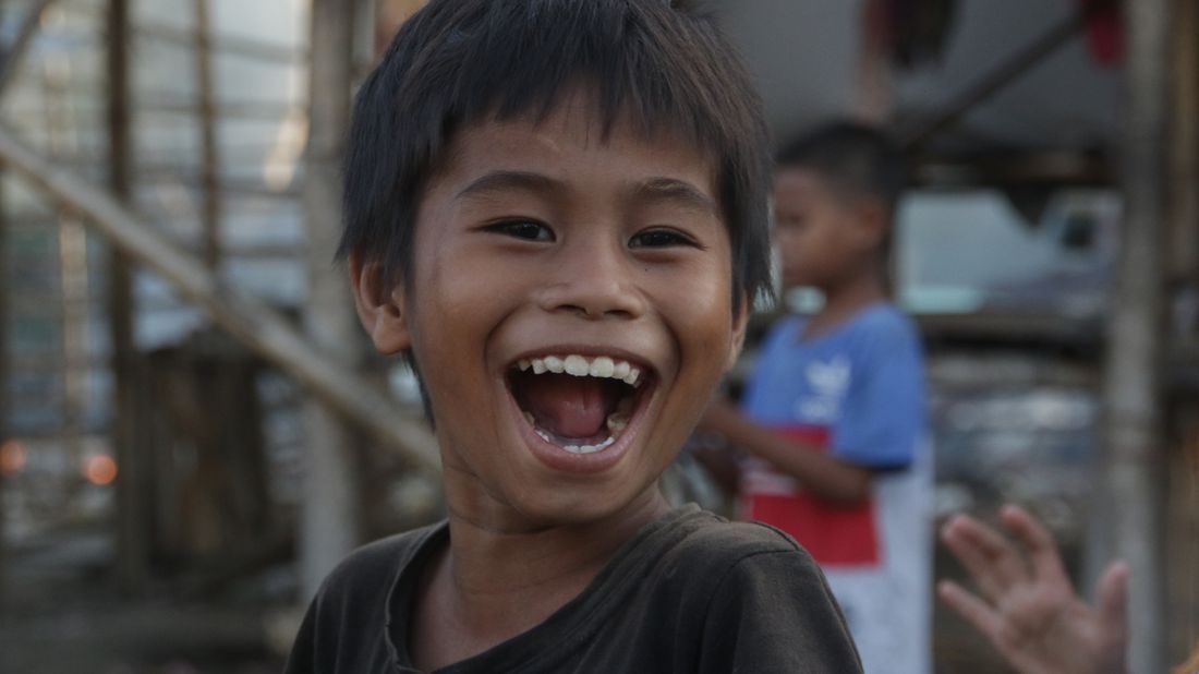 A laughing boy full of delight
