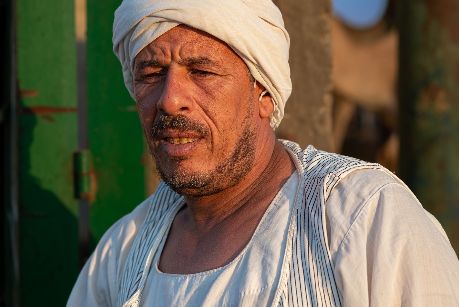 An older Egyptian man in traditional dress