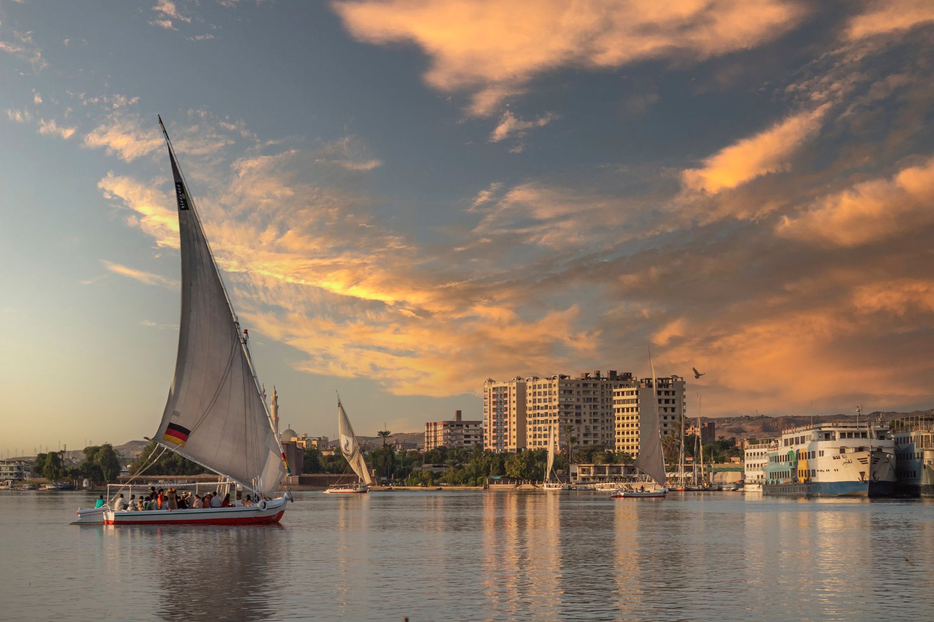 A felucca sailing the Nile at sunset