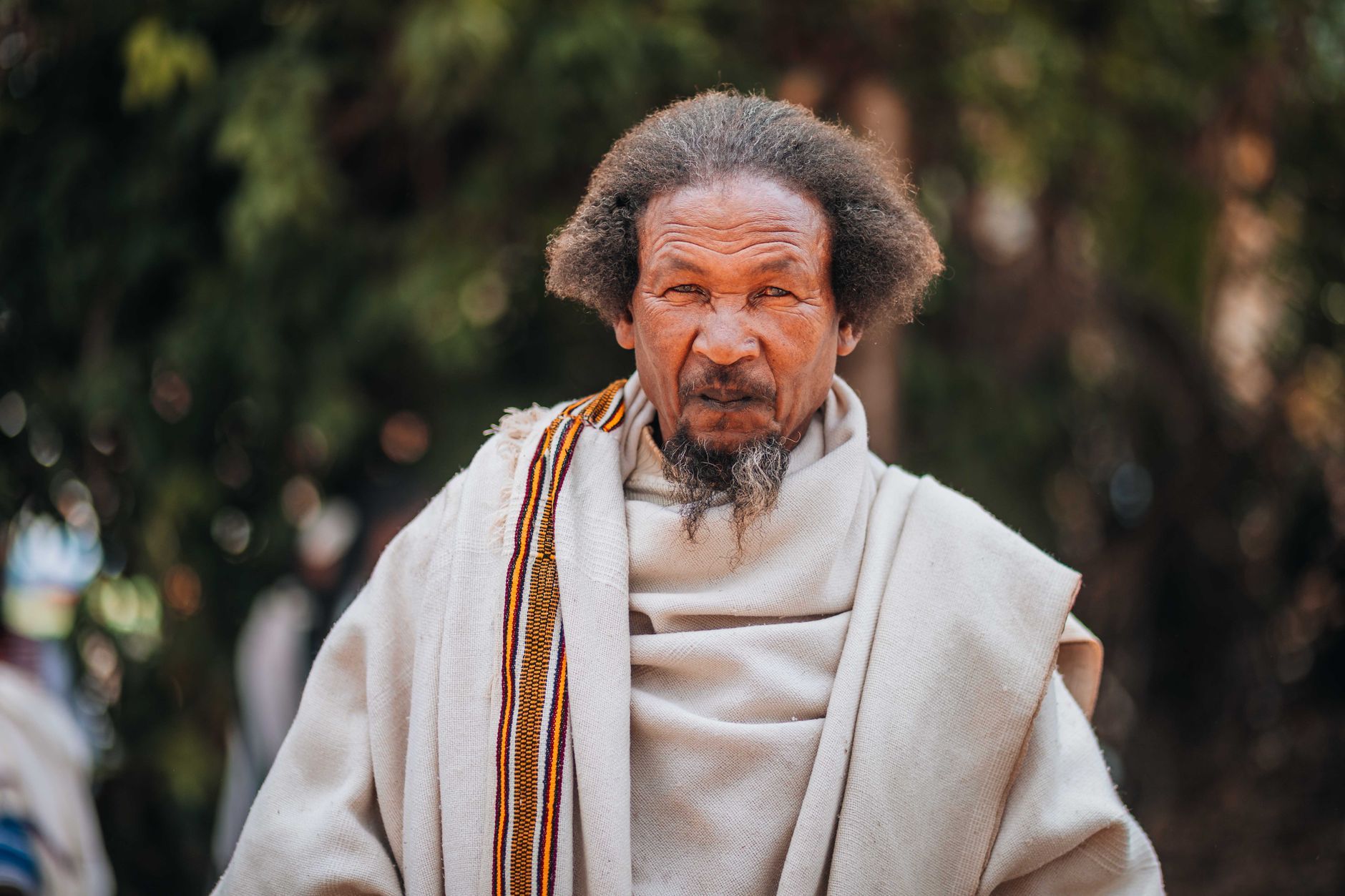 A senior Ethiopian man in a traditional robe