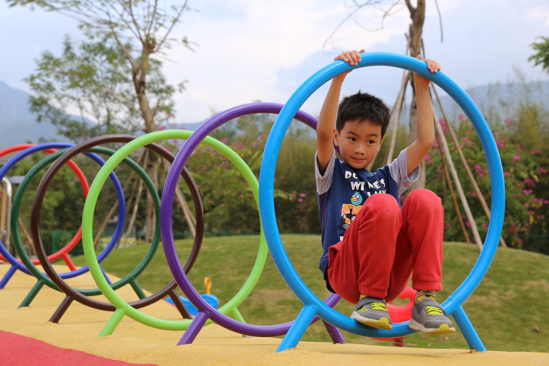 A boy playing in a park in Hong Kong