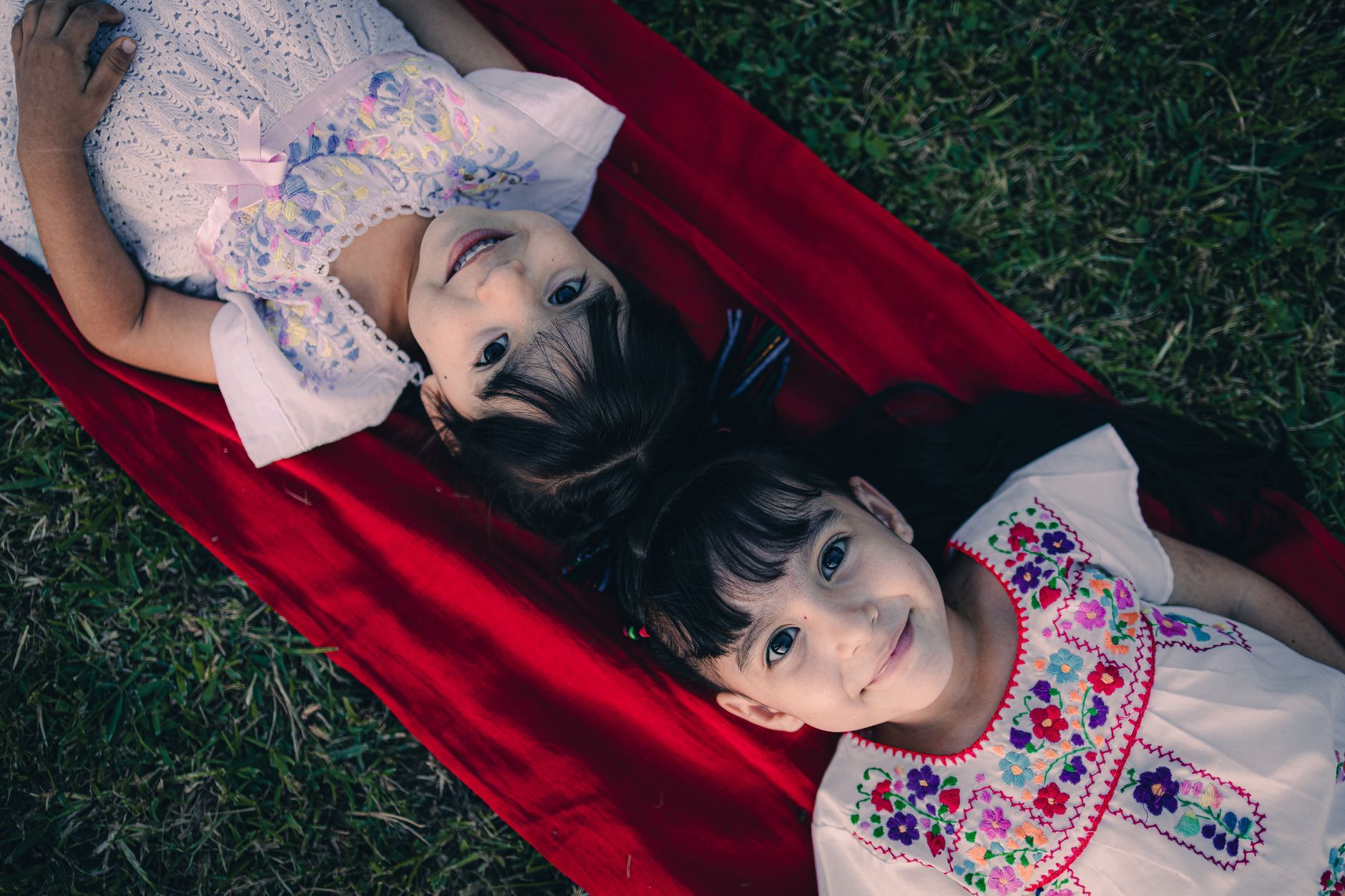 Two girls in traditional dress in Mexico
