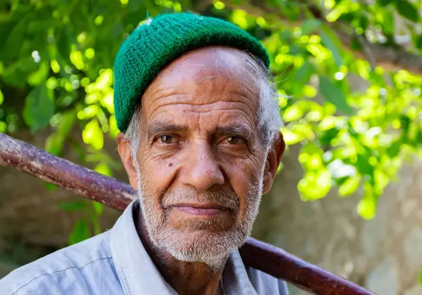 An elderly Iranian man