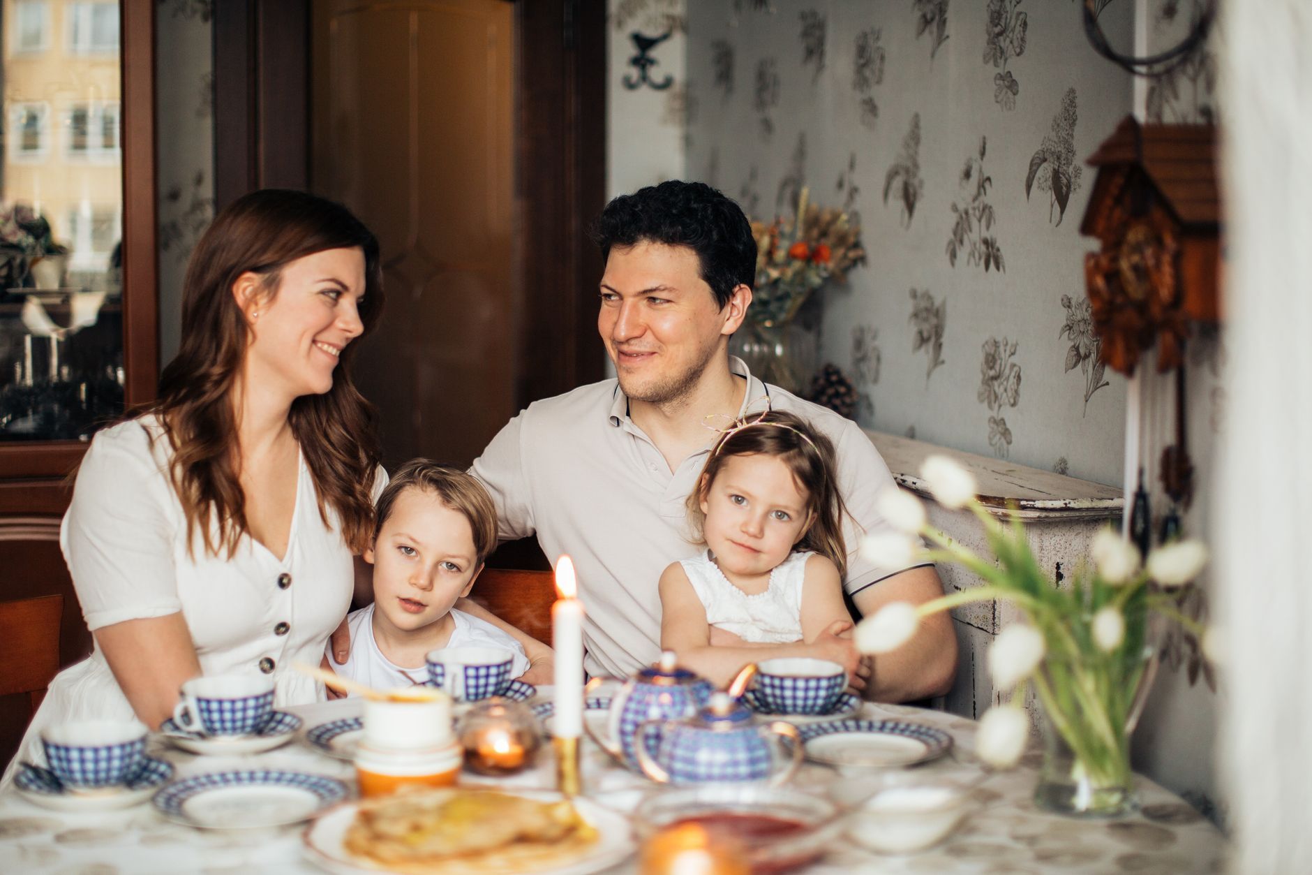 A Russian family gathered around the table
