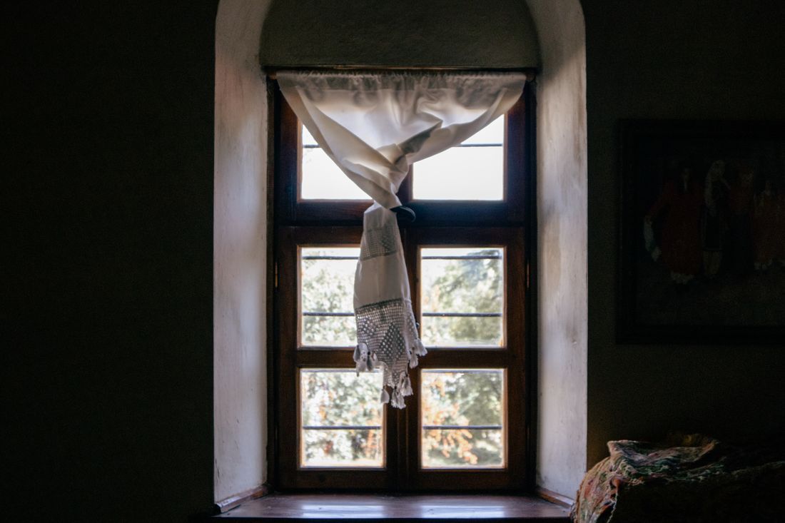 Soft light coming through an arched window