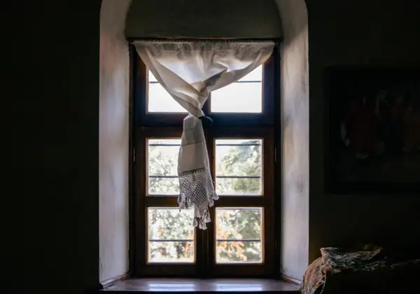 Soft light coming through an arched window