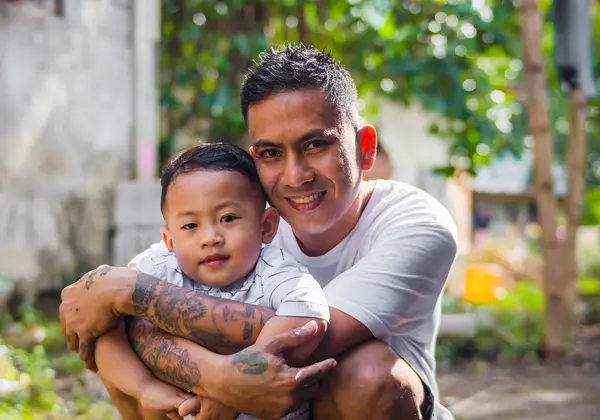 A Filipino father and son