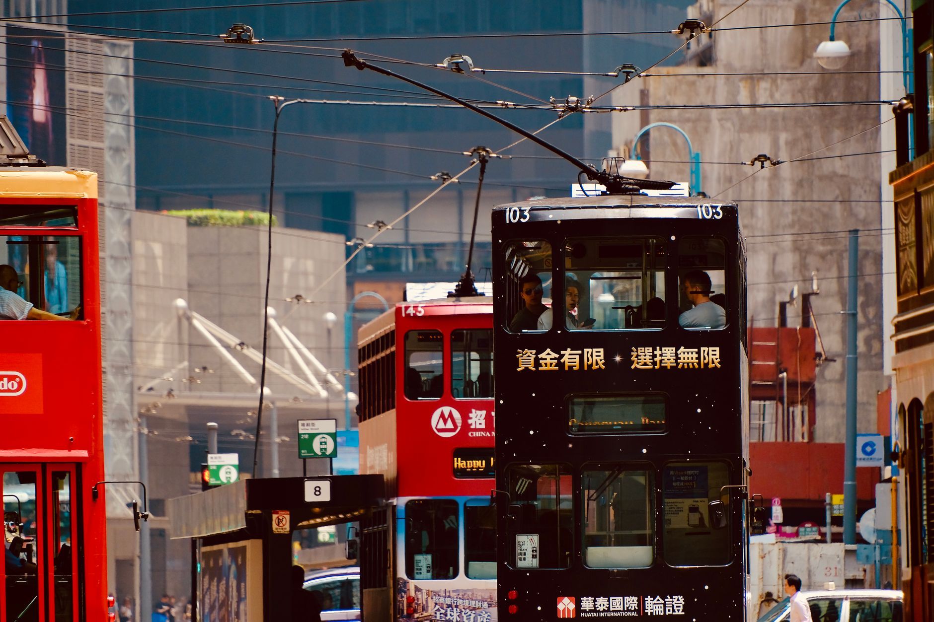Double-decker trams on a Hong Kong street