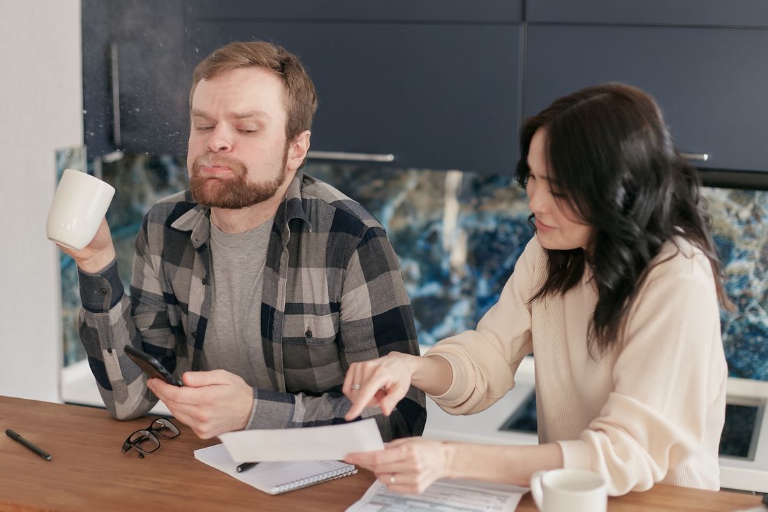 A couple working through their bills together