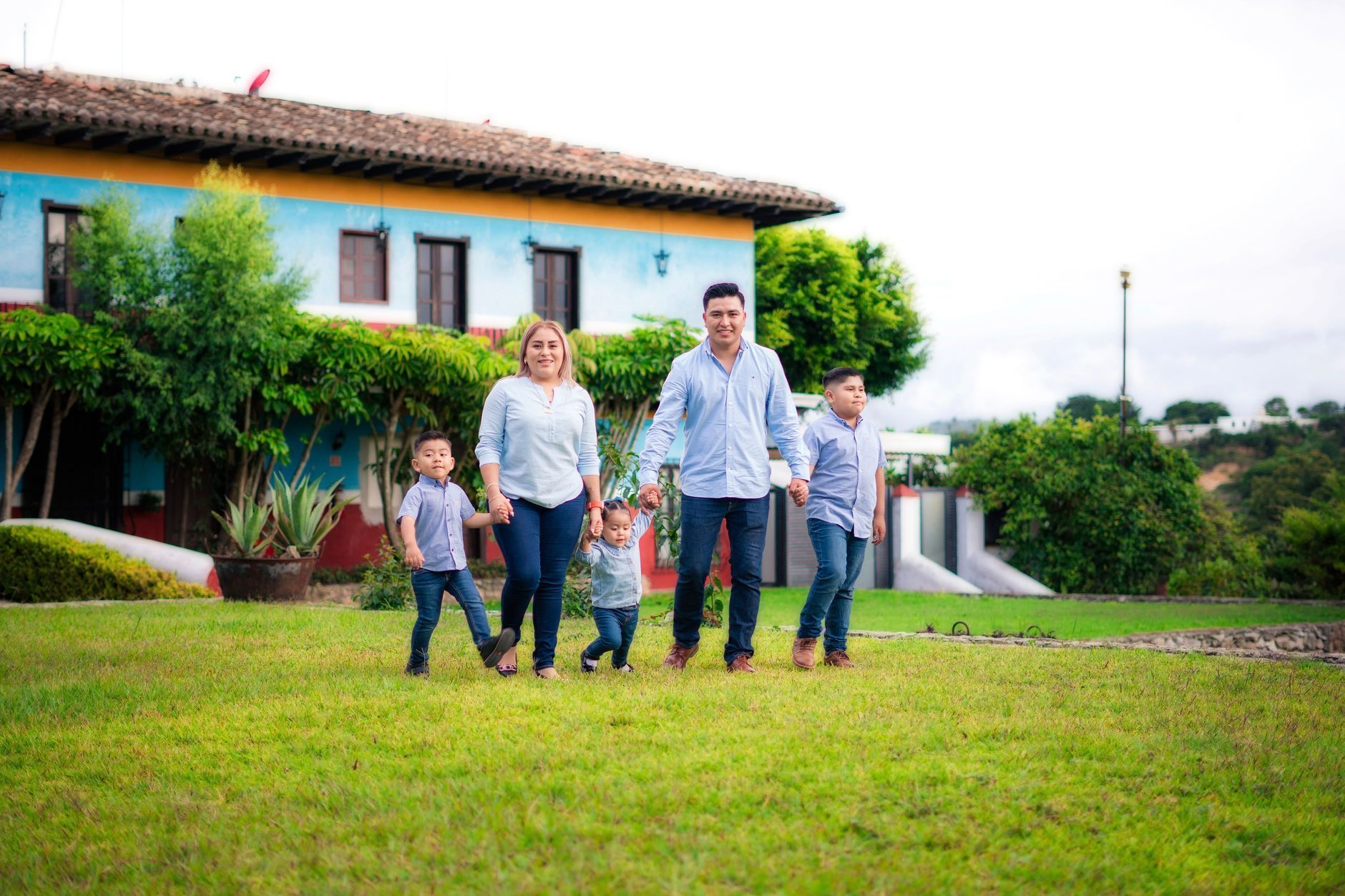 A Hispanic American family walking together outdoors