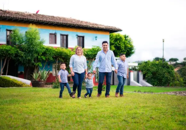 A Hispanic American family walking together outdoors