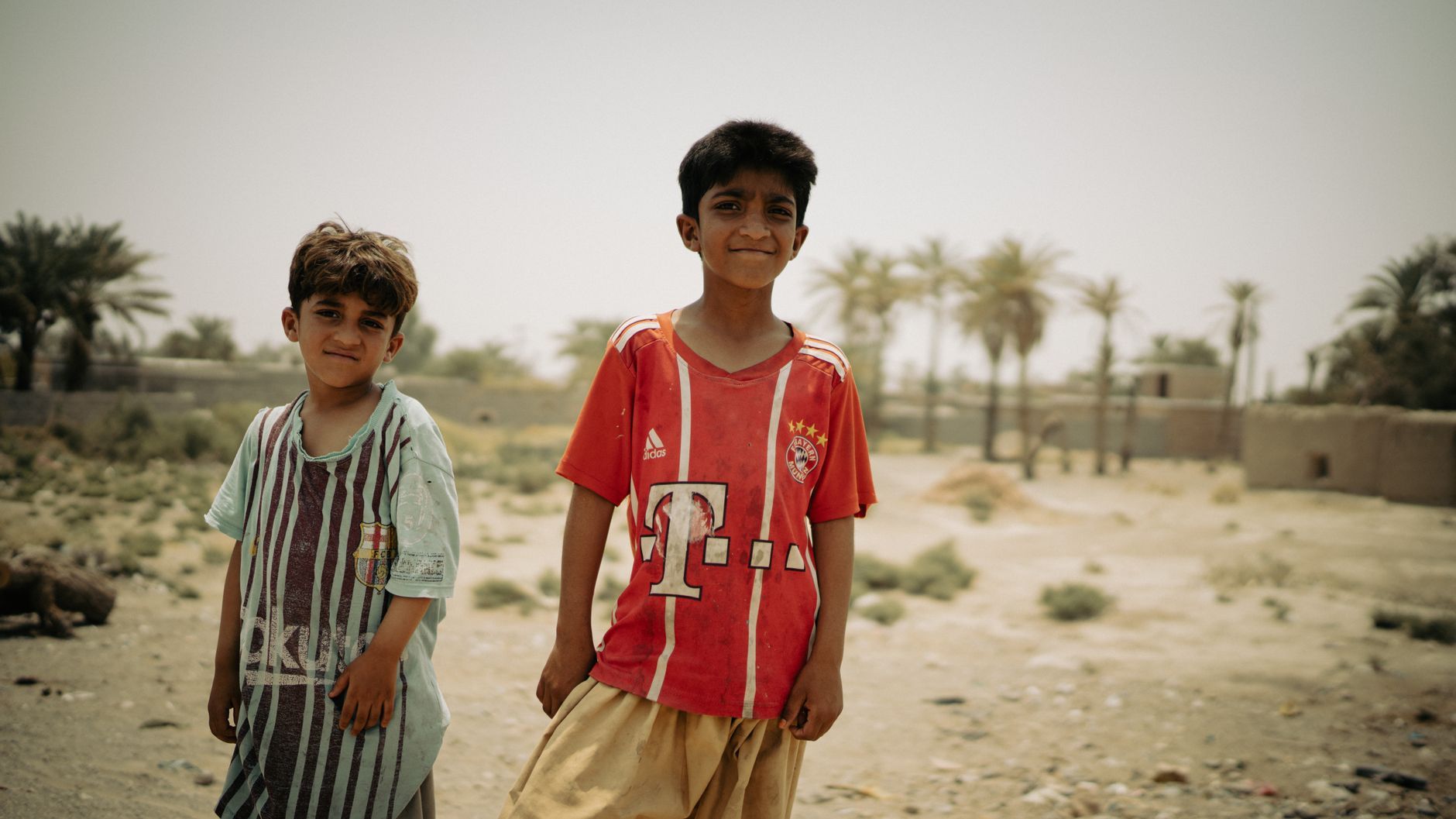 Two Iranian boys in a village