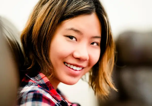 A smiling young Chinese woman