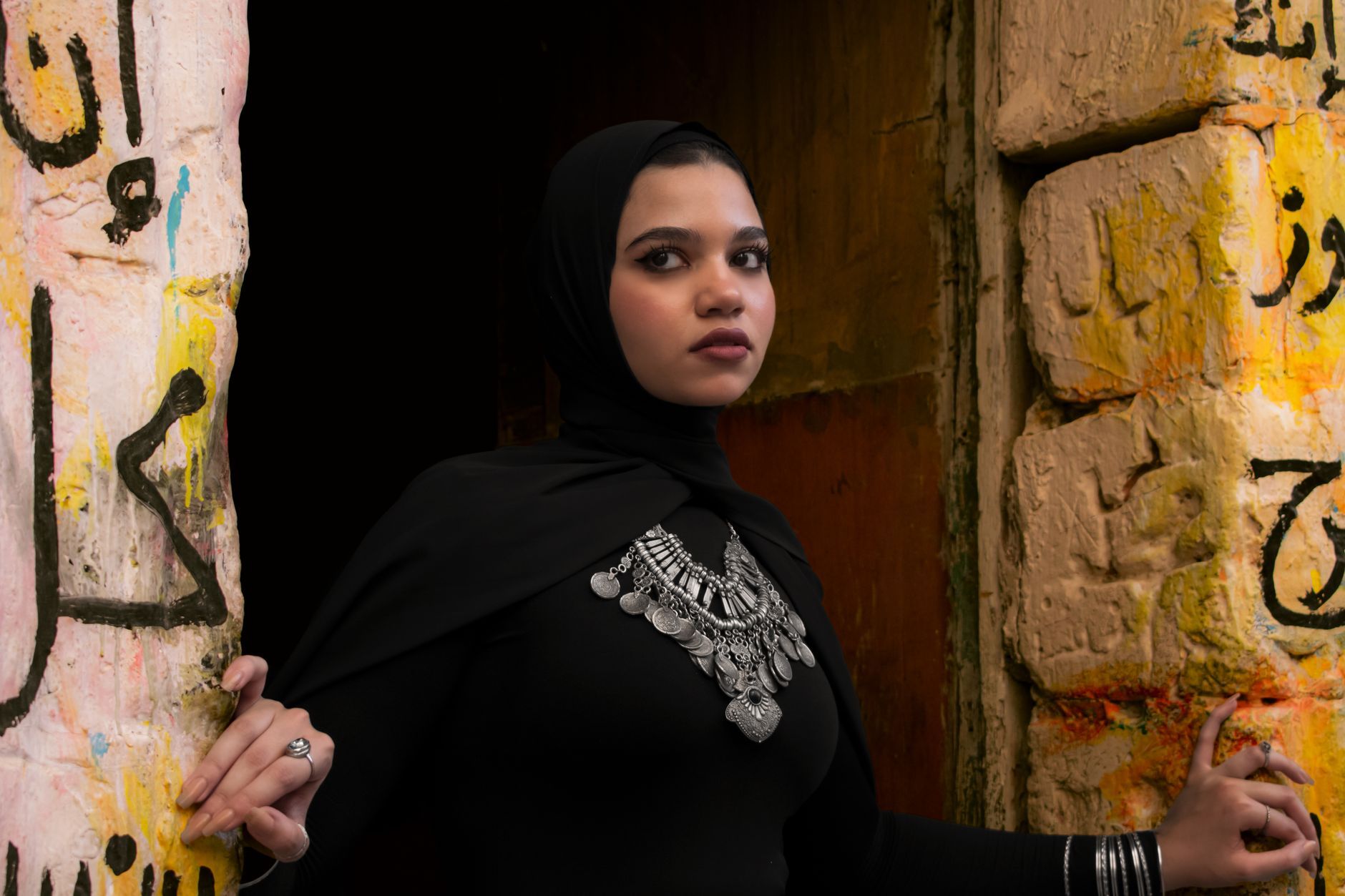 A young Egyptian woman in an old quarter of the city