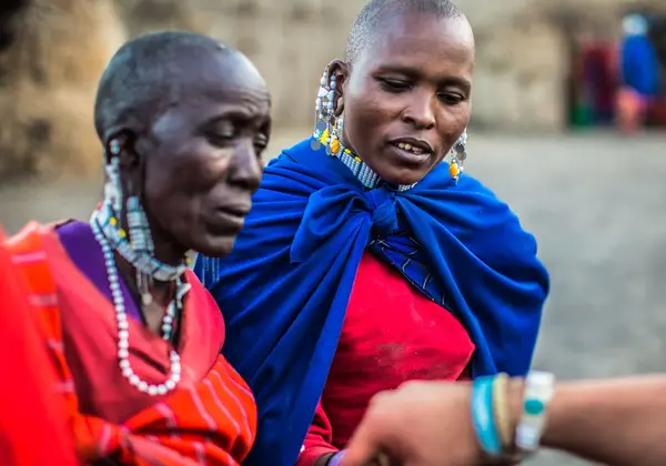 Two Maasai women in traditional attire, Tanzania
