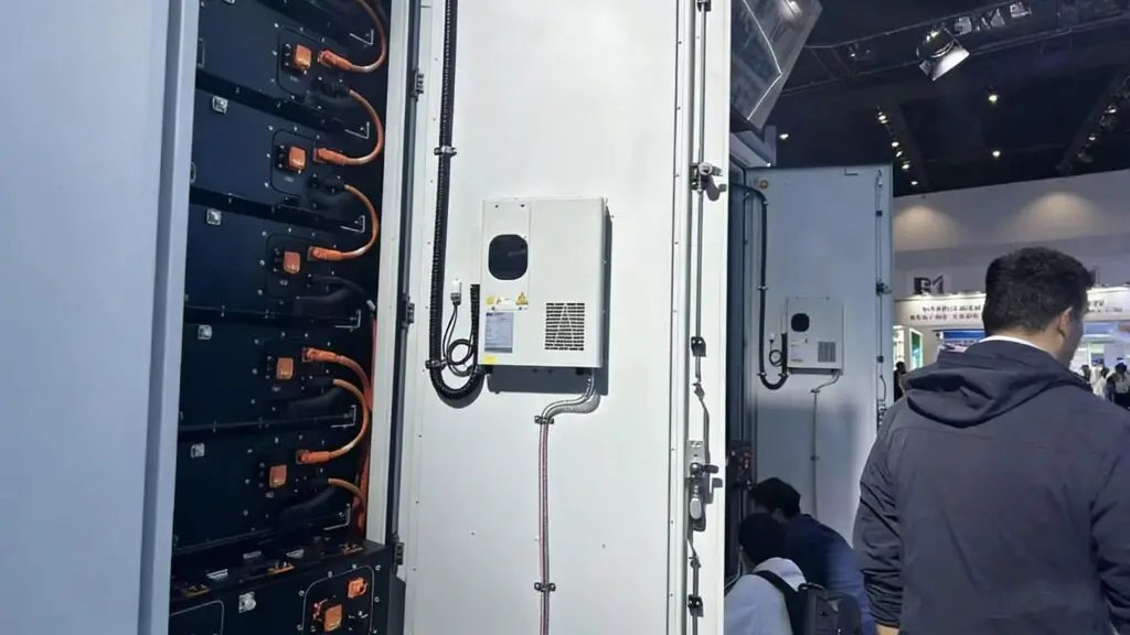 Compact dehumidifier installed inside an electrical control cabinet.