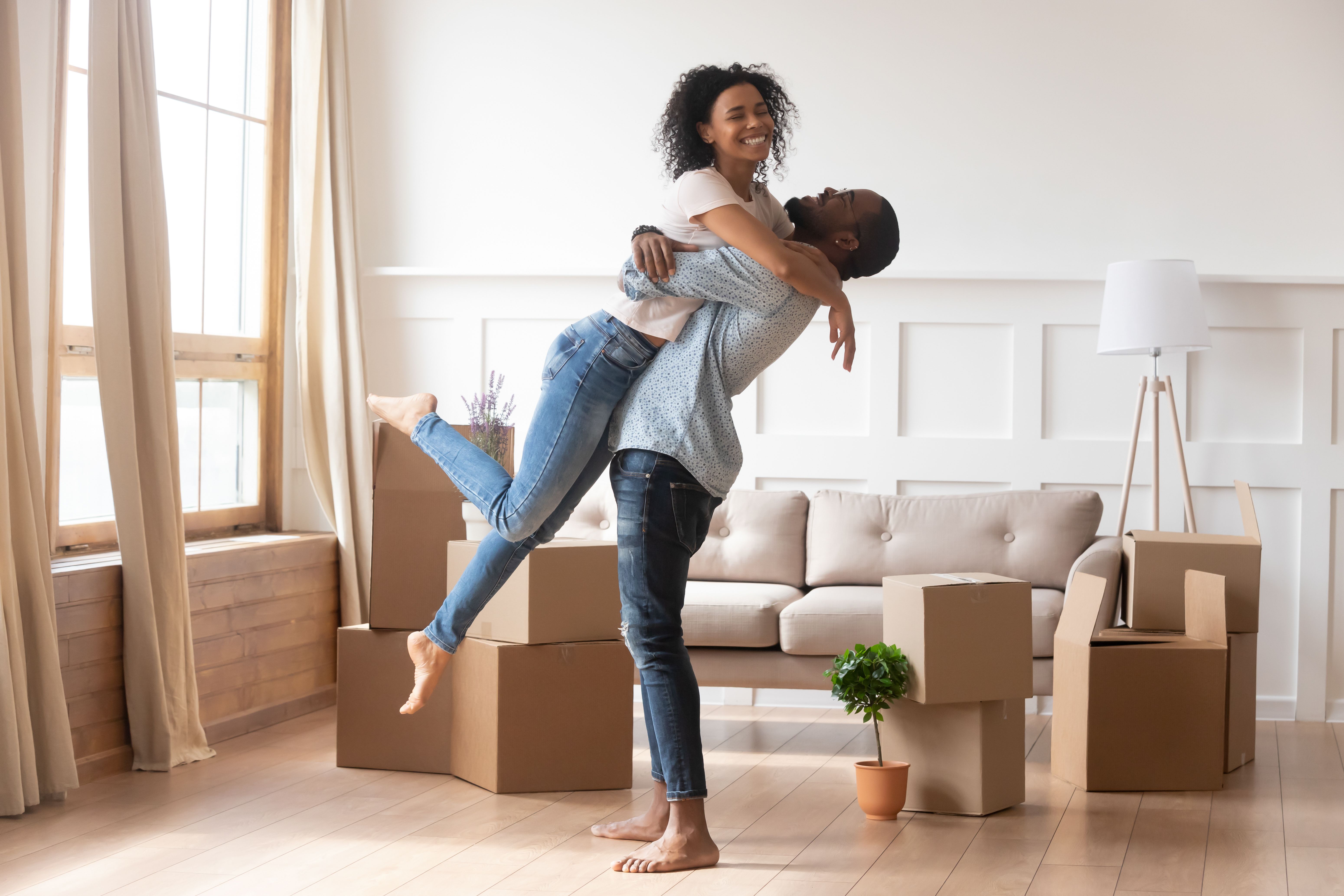 First time home buyers celebrate new house purchase on moving day, smiling husband embracing lifting excited young wife laughing standing among boxes in own house​​​​‌﻿‍﻿​‍​‍‌‍﻿﻿‌﻿​‍‌‍‍‌‌‍‌﻿‌‍‍‌‌‍﻿‍​‍​‍​﻿‍‍​‍​‍‌﻿​﻿‌‍​‌‌‍﻿‍‌‍‍‌‌﻿‌​‌﻿‍‌​‍﻿‍‌‍‍‌‌‍﻿﻿​‍​‍​‍﻿​​‍​‍‌‍‍​‌﻿​‍‌‍‌‌‌‍‌‍​‍​‍​﻿‍‍​‍​‍​‍﻿﻿‌‍​‌‌‍‌​‌‍﻿‌‌‍‍‌‌‍﻿‍​‍﻿﻿‌﻿​﻿‌‍​‌‌‍﻿‍‌‍‍‌‌﻿‌​‌﻿‍‌​‍﻿﻿‌‍‍‌‌‍﻿‍‌﻿‌​‌‍‌‌‌‍﻿‍‌﻿‌​​‍﻿﻿‌‍‌‌‌‍‌​‌‍‍‌‌﻿‌​​‍﻿﻿‌‍﻿‌‌‍﻿﻿‌‍‌​‌‍‌‌​﻿﻿‌‌﻿​​‌﻿​‍‌‍‌‌‌﻿​﻿‌‍‌‌‌‍﻿‍‌﻿‌​‌‍​‌‌﻿‌​‌‍‍‌‌‍﻿﻿‌‍﻿‍​﻿‍﻿‌‍‍‌‌‍‌​​﻿﻿‌‌‍​‍​﻿‌‌​﻿​﻿​﻿​﻿​﻿‍‌‌‍​‍‌‍‌​​﻿​​​‍﻿‌‌‍‌‌​﻿‍​‌‍‌‌​﻿‌‍​‍﻿‌​﻿‌​‌‍‌‌​﻿‍​‌‍‌‍​‍﻿‌‌‍​‍‌‍​‍​﻿‍​‌‍​‌​‍﻿‌​﻿​​‌‍​﻿‌‍​‌​﻿​​​﻿‌​‌‍​‌​﻿‍​​﻿​‌‌‍‌‍​﻿‍‌‌‍​‌​﻿‍​​﻿‍﻿‌﻿‌​‌﻿‍‌‌﻿​​‌‍‌‌​﻿﻿‌‌‍﻿‍‌‍‌‌‌﻿‌﻿‌﻿​﻿‌‌​​‌‍﻿﻿‌﻿​﻿‌﻿‌​​﻿‍﻿‌﻿​​‌‍​‌‌﻿‌​‌‍‍​​﻿﻿‌‌‍﻿‌‌‍​‌‌‍‍‌‌‍﻿‍‌​‍‌‌‍﻿‌‌‍​‌‌‍‌﻿‌‍‌‌​‍﻿‍‌‍​‌‌‍﻿​‌﻿‌​​﻿﻿﻿‌‍​‍‌‍​‌‌﻿​﻿‌‍‌‌‌‌‌‌‌﻿​‍‌‍﻿​​﻿﻿‌​‍‌‌​﻿​‍‌​‌‍‌‍​‌‌‍‌​‌‍﻿‌‌‍‍‌‌‍﻿‍​‍‌‌​﻿​‍‌​‌‍‌﻿​﻿‌‍​‌‌‍﻿‍‌‍‍‌‌﻿‌​‌﻿‍‌​‍‌‍‌‍‍‌‌‍‌​​﻿﻿‌‌‍​‍​﻿‌‌​﻿​﻿​﻿​﻿​﻿‍‌‌‍​‍‌‍‌​​﻿​​​‍﻿‌‌‍‌‌​﻿‍​‌‍‌‌​﻿‌‍​‍﻿‌​﻿‌​‌‍‌‌​﻿‍​‌‍‌‍​‍﻿‌‌‍​‍‌‍​‍​﻿‍​‌‍​‌​‍﻿‌​﻿​​‌‍​﻿‌‍​‌​﻿​​​﻿‌​‌‍​‌​﻿‍​​﻿​‌‌‍‌‍​﻿‍‌‌‍​‌​﻿‍​​‍‌‍‌﻿‌​‌﻿‍‌‌﻿​​‌‍‌‌​﻿﻿‌‌‍﻿‍‌‍‌‌‌﻿‌﻿‌﻿​﻿‌‌​​‌‍﻿﻿‌﻿​﻿‌﻿‌​​‍‌‍‌﻿​​‌‍​‌‌﻿‌​‌‍‍​​﻿﻿‌‌‍﻿‌‌‍​‌‌‍‍‌‌‍﻿‍‌​‍‌‌‍﻿‌‌‍​‌‌‍‌﻿‌‍‌‌​‍﻿‍‌‍​‌‌‍﻿​‌﻿‌​​‍‌‍‌﻿​​‌‍‌‌‌﻿​‍‌﻿​﻿‌﻿​​‌‍‌‌‌‍​﻿‌﻿‌​‌‍‍‌‌﻿‌‍‌‍‌‌​﻿﻿‌‌﻿​​‌﻿‌‌‌‍​‍‌‍﻿​‌‍‍‌‌﻿​﻿‌‍‍​‌‍‌‌‌‍‌​​‍​‍‌﻿﻿‌