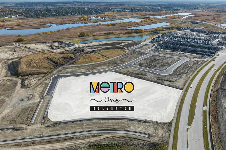Aerial view of the Metro One development in Calgary, Alberta, highlighting buildings and surrounding landscape.  