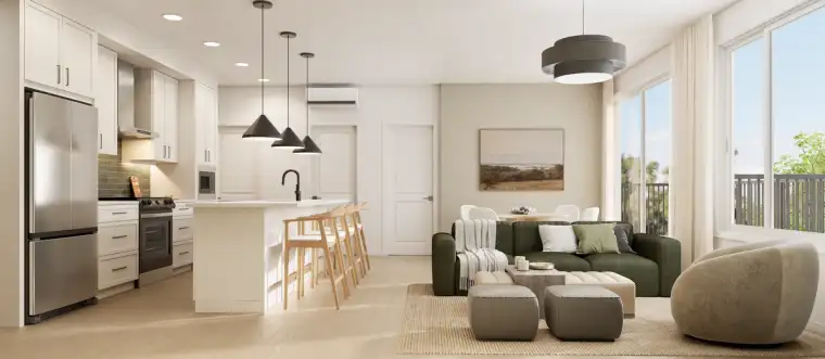 Bright open-concept condo interior with a modern kitchen, large island with seating, and a sunlit living room with balcony access