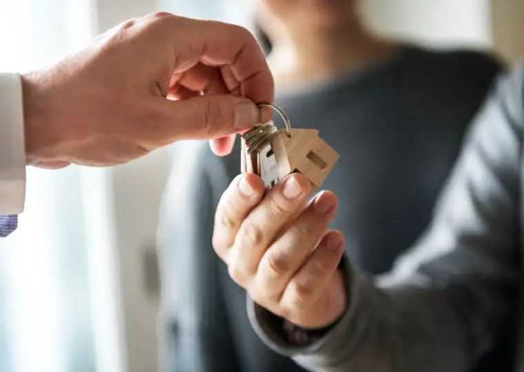 House keys being handed to a new homeowner
