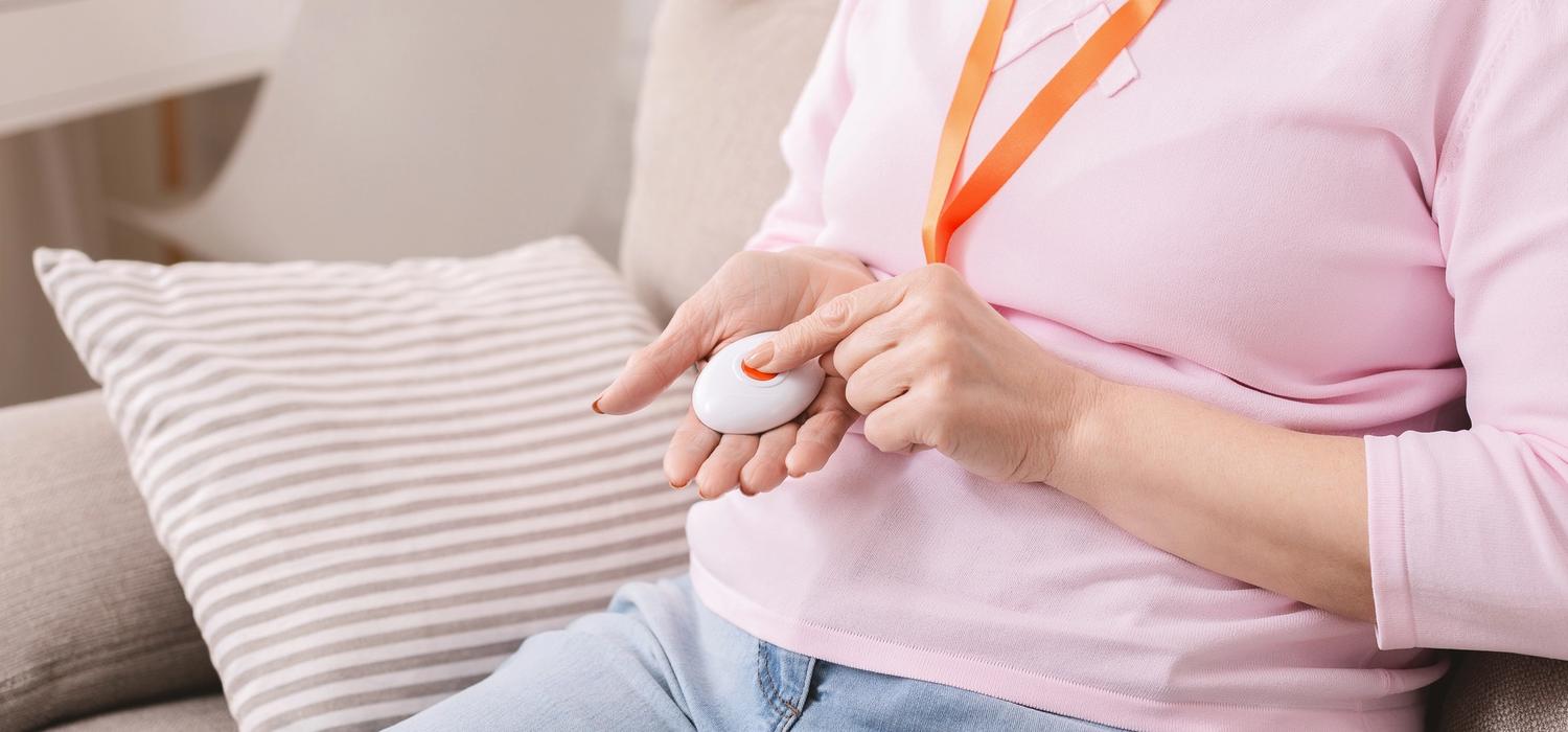 Person with emergency alarm