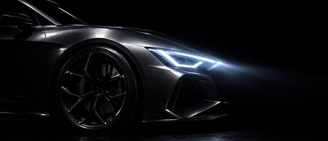 Custom LED headlight build featuring sharp geometric daytime running lights on a sports car. Flawless aftermarket automotive lighting upgrades and front-end illumination styling by expert technicians in Houston, TX.