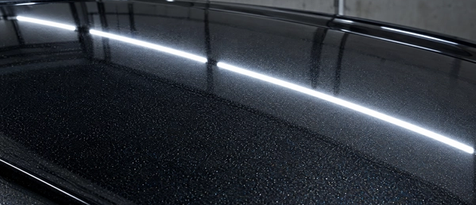 Extreme macro detail of swirl-free automotive paint after professional multi-stage correction. Restoring ultimate depth, gloss, and clarity to high-end luxury vehicle finishes across Houston, Cypress, Spring, and the greater Texas area.