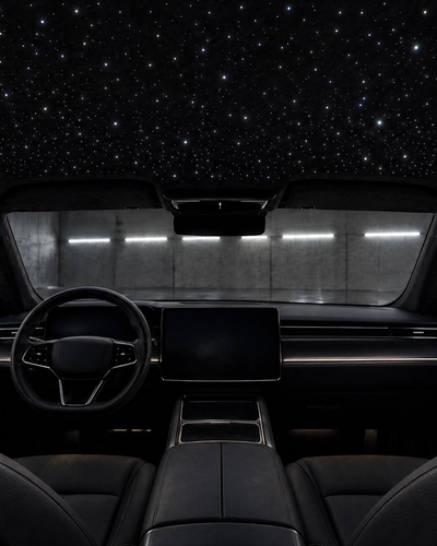 Custom starlight headliner installation and premium automotive lighting in Houston, Texas. Interior view of a luxury vehicle featuring a bespoke fiber optic star ceiling. Expert interior lighting upgrades for Teslas, exotics, and custom builds across