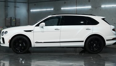 BENTLEY WITH FULL BLACKOUT PACKAGE. Custom vehicle blackout packages and chrome delete services in Houston, Texas.
