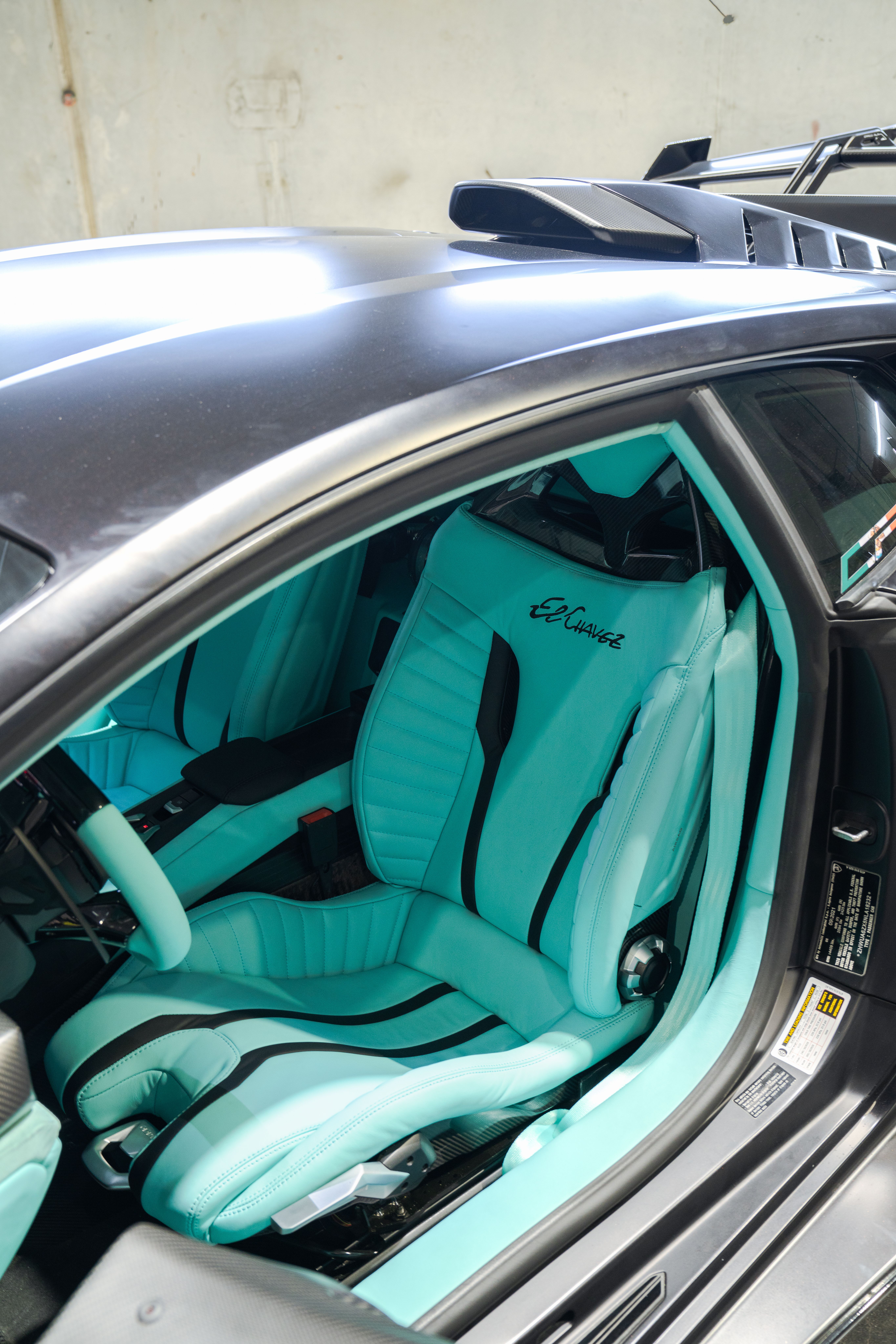 Custom car seat retrim and leather upholstery repair in Houston, TX. Premium automotive leather, suede, and custom seat restoration for luxury vehicles and sports cars.
