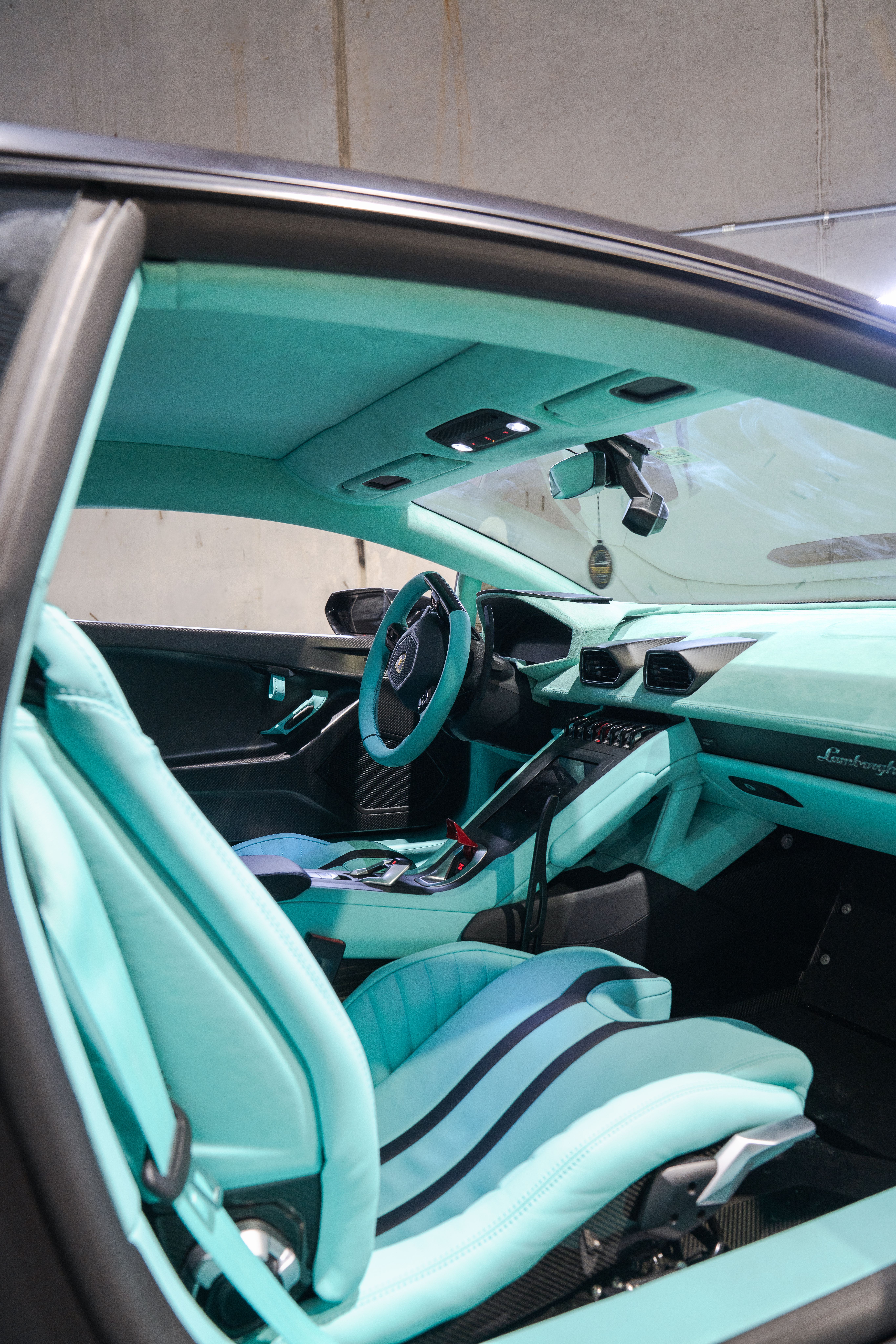 Complete vehicle interior retrim and custom cabin restoration in Houston. Full leather wrapping for seats, door panels, headliners, and dashboards serving Texas exotic and luxury car owners.