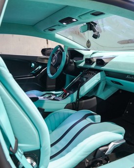 Complete vehicle interior retrim and custom cabin restoration in Houston. Full leather wrapping for seats, door panels, headliners, and dashboards serving Texas exotic and luxury car owners.