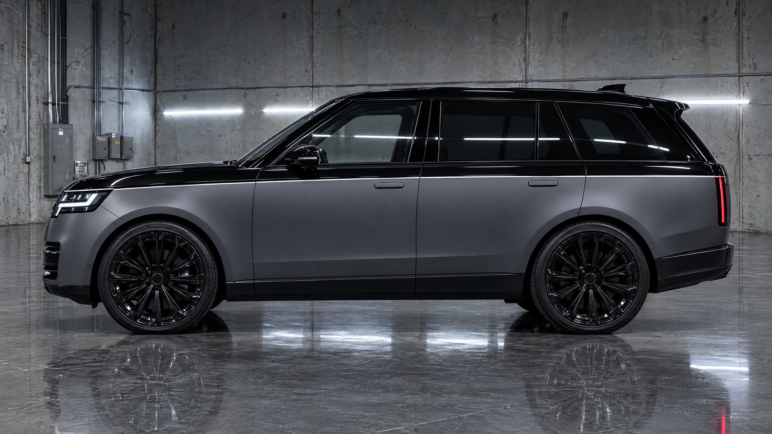 * Executive two-tone vehicle wrap featuring slate gray and gloss black on a full-size luxury SUV in Houston, Texas. Premium contrasting roof and body wrap combinations.