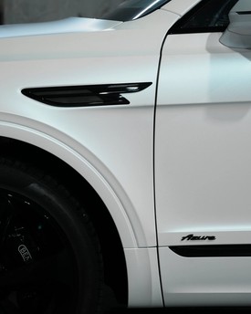 Badge and trim vehicle blackout package bentley. Automotive chrome delete and badge blackout services in Houston. Satin and gloss black vinyl wrap wrapping for window trim, door handles, and factory emblems.