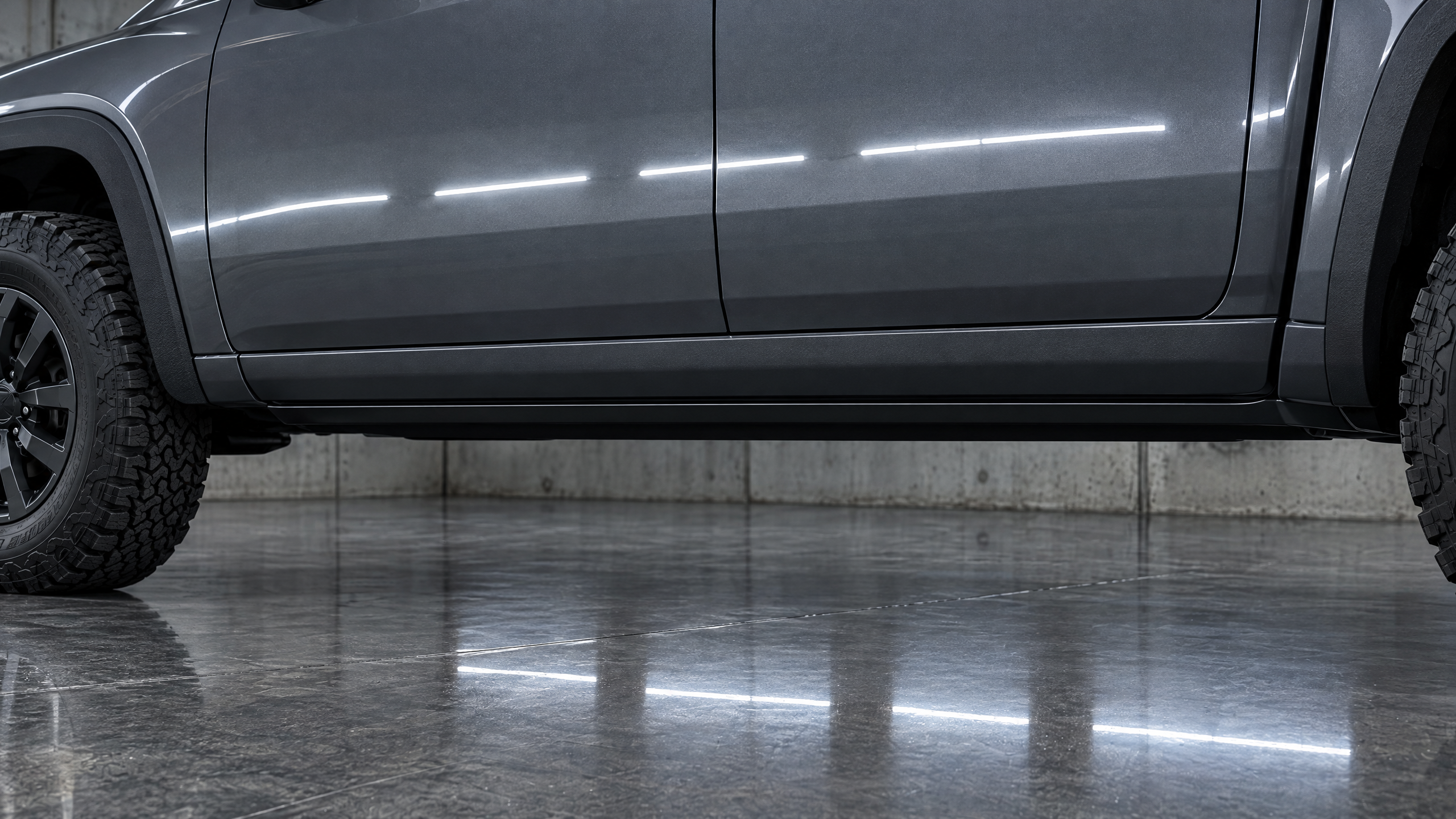 Hidden electric side steps and low-profile running boards in Houston, Texas. Maintaining lifted truck aesthetics and rock crawler clearance with automated retractable step systems.