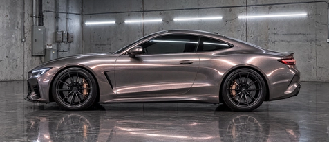 Rose-gold and gray color-shift vinyl wrap on a Porsche sports coupe in Houston, TX. High-end iridescent cast film installation and smooth curved panel wrapping.