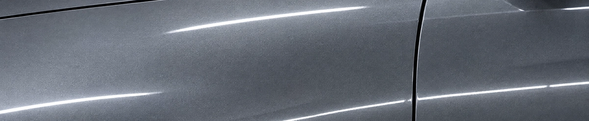 * Undetectable auto paint color matching and perfect panel blending. A seamlessly matched luxury SUV door and fender showing consistent metallic texture and factory depth, performed at our premier in-house auto body shop in Houston, Texas.