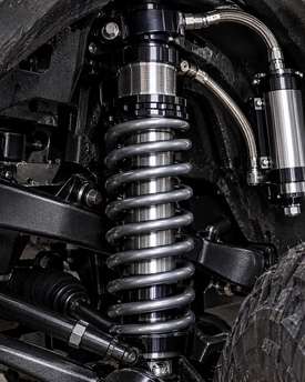 High-clearance off-road coilover installation and tuning for Jeeps, trucks, and Polaris Slingshots. We supply and dial in adjustable remote-reservoir coilovers from industry leaders like King Shocks, Fox Racing, Icon Vehicle Dynamics, and Bilstein.