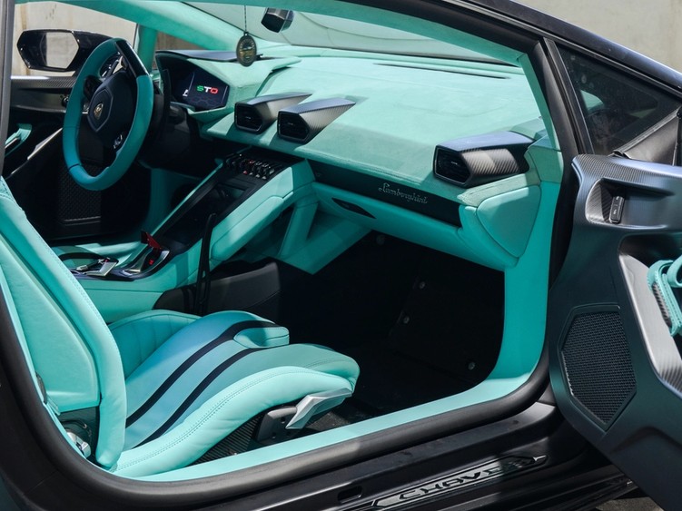 LAMBORGHINI STO TIFFANY BLUE INTERIOR TRANSFORMATION. Custom vehicle interior transformation and luxury leather upholstery in Houston, Texas. Bespoke interior retrimming, fine leathers, and custom stitching designed in-house for high-end cars, exotics, and custom builds across The Woodlands, Katy, and Sugar Land.