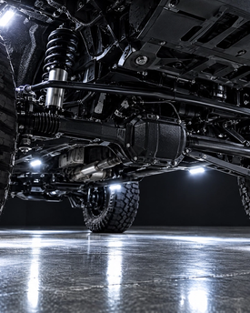 Heavy-duty off-road lighting and rock light installation for lifted trucks and 4x4s in Houston, Texas. High-output undercarriage LEDs and custom exterior illumination for superior off-road visibility and aggressive styling.