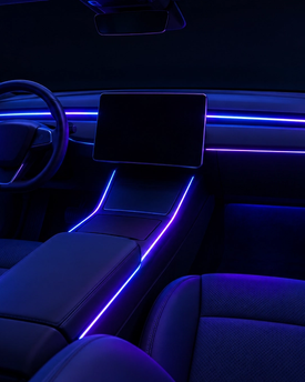 Seamless LED ambient interior lighting installation for Teslas and modern luxury vehicles in Texas. Precision-integrated neon light tubes enhancing the center console and doors for a futuristic, OEM-plus cabin atmosphere.