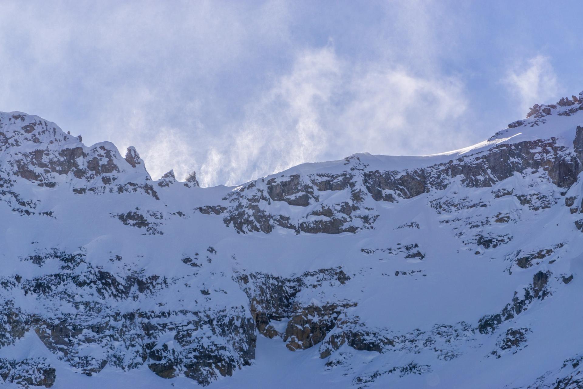 Snow blowing over ridge