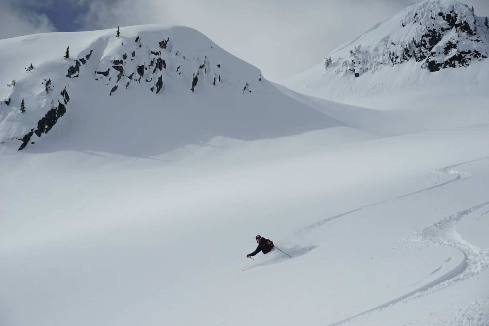 This skier is in low-angle, simple terrain.
