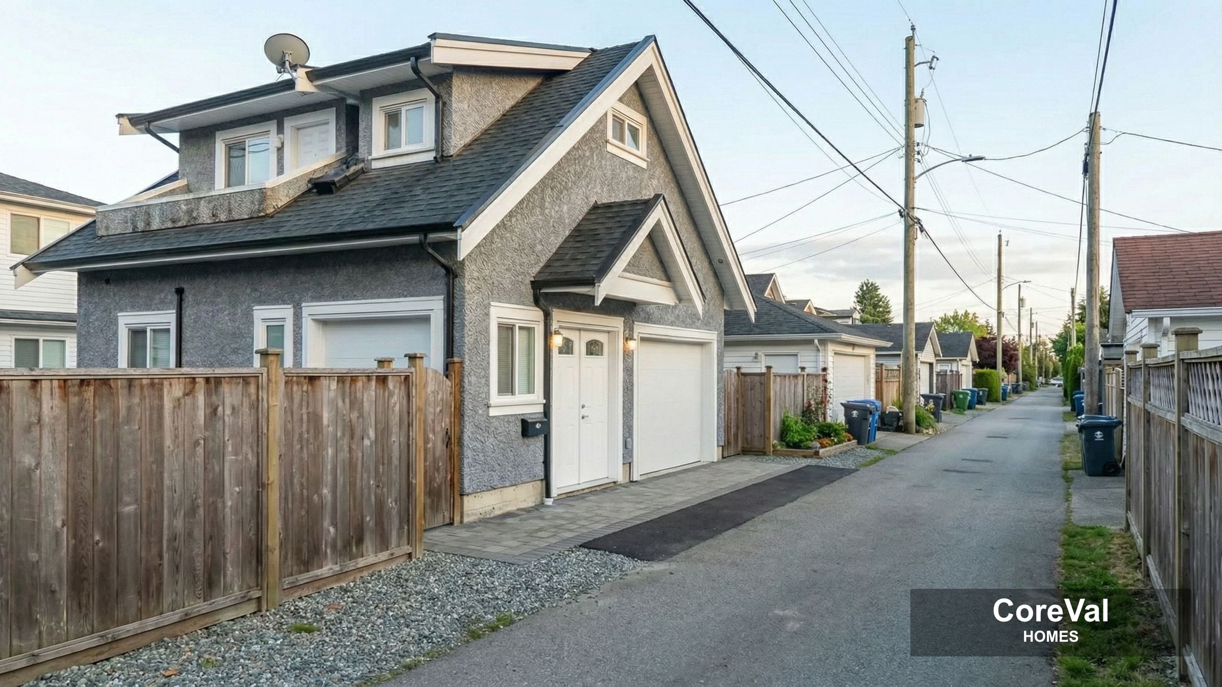 Vancouver laneway home with wood fencing along the property line