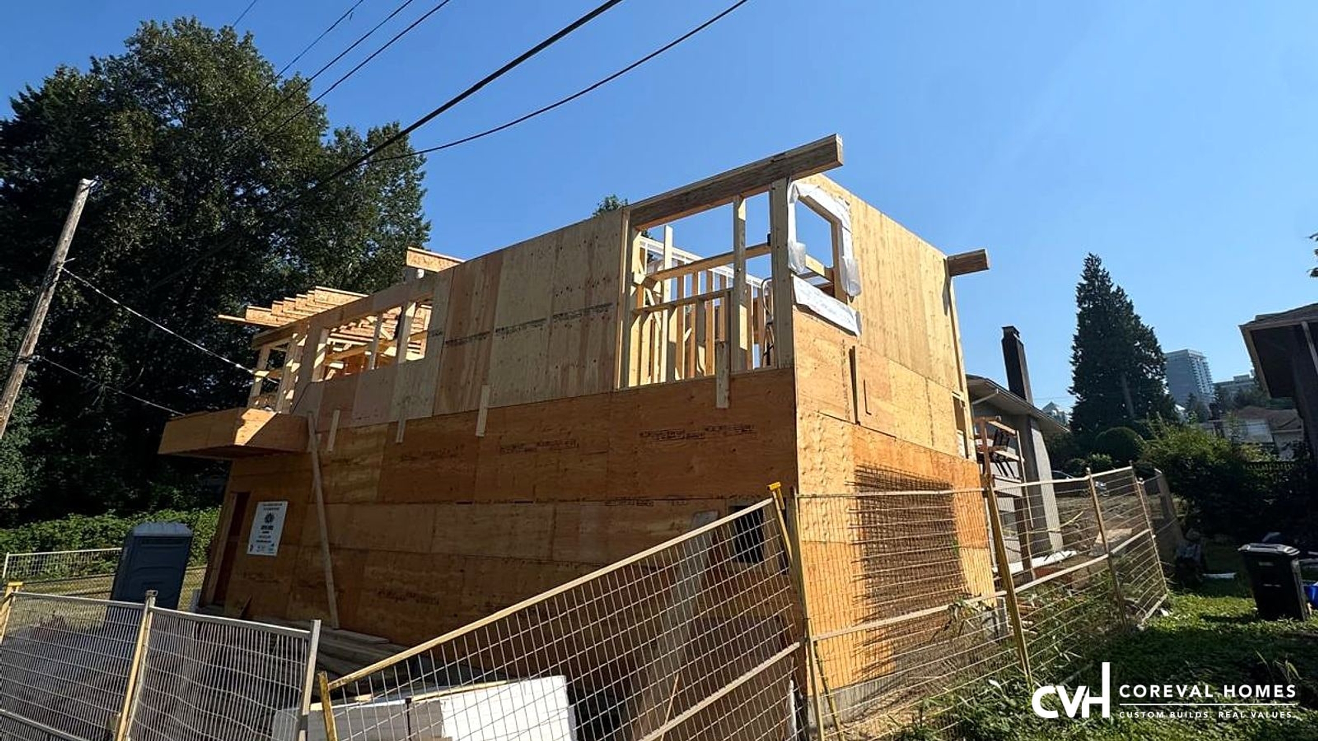 Laneway home under construction in Burnaby, BC at framing and sheathing stage — CoreVal Homes