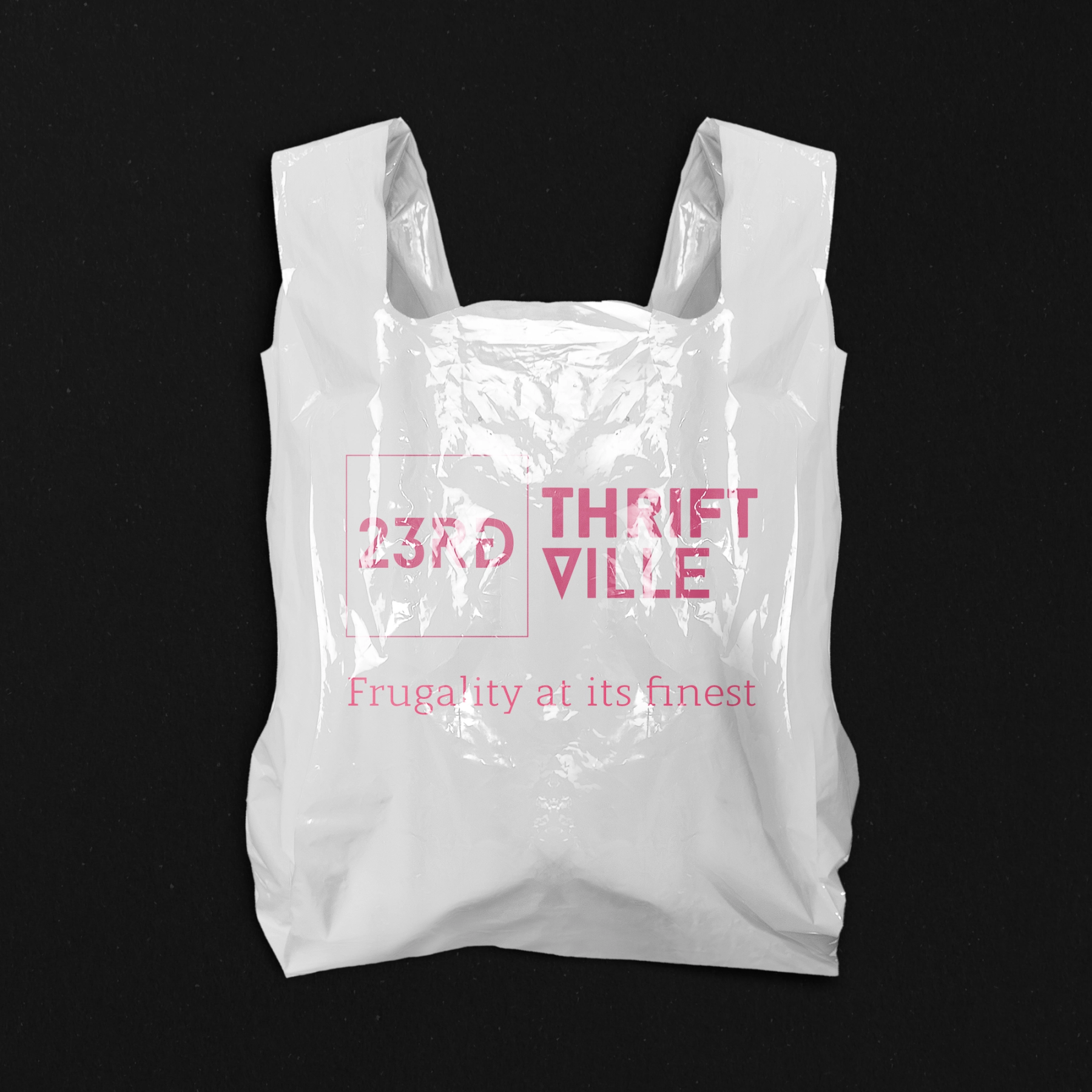 23rd Thrift Ville identity on a white plastic bag against black