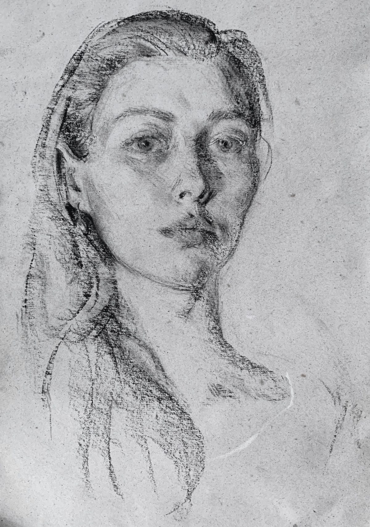 Charcoal self-portrait of a woman with a braided ponytail.